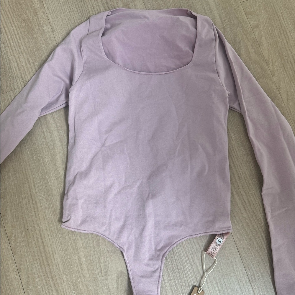 Brand new skims pink body suit